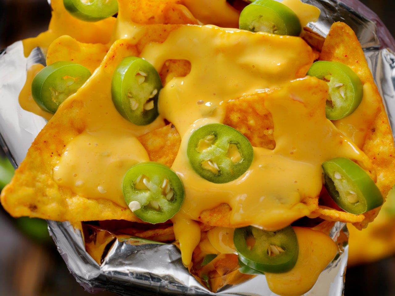 Nacho-Tortilla-Chips-in-a-bag-with-Cheese-Sauce-and-Jalapenos ...